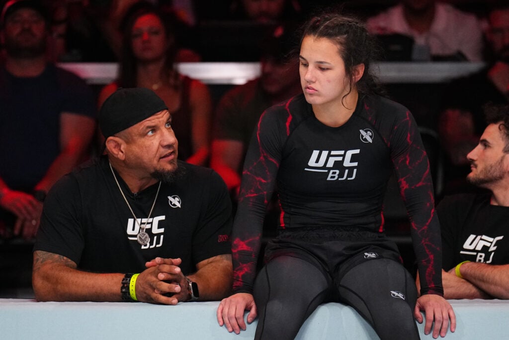 Bella Mir sits with her father, Frank Mir, as she prepares to face Carol Joia at UFC BJJ 1