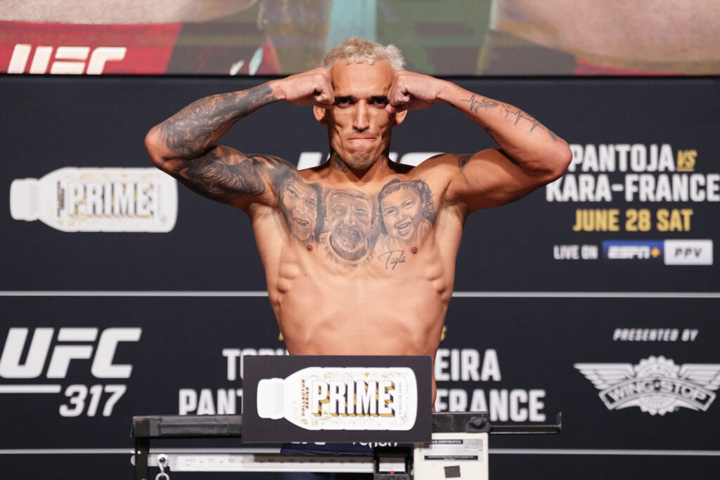 Charles Oliveira weighs-in for UFC 317