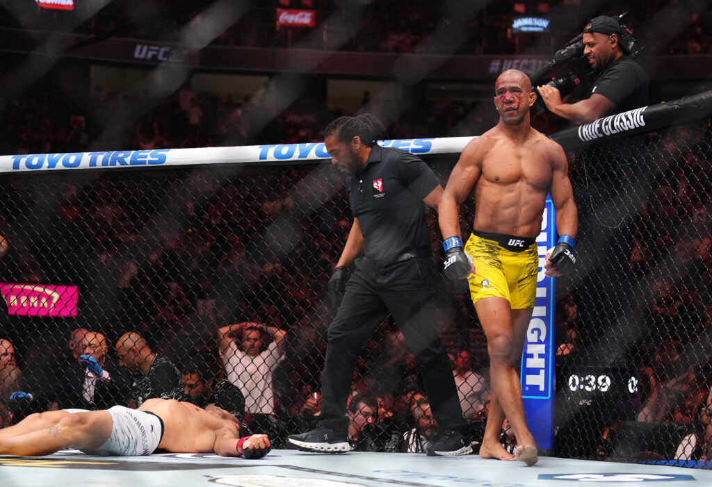 Image of Gregory Rodrigues walking away from KO'ed Jack Hermansson at UFC 317