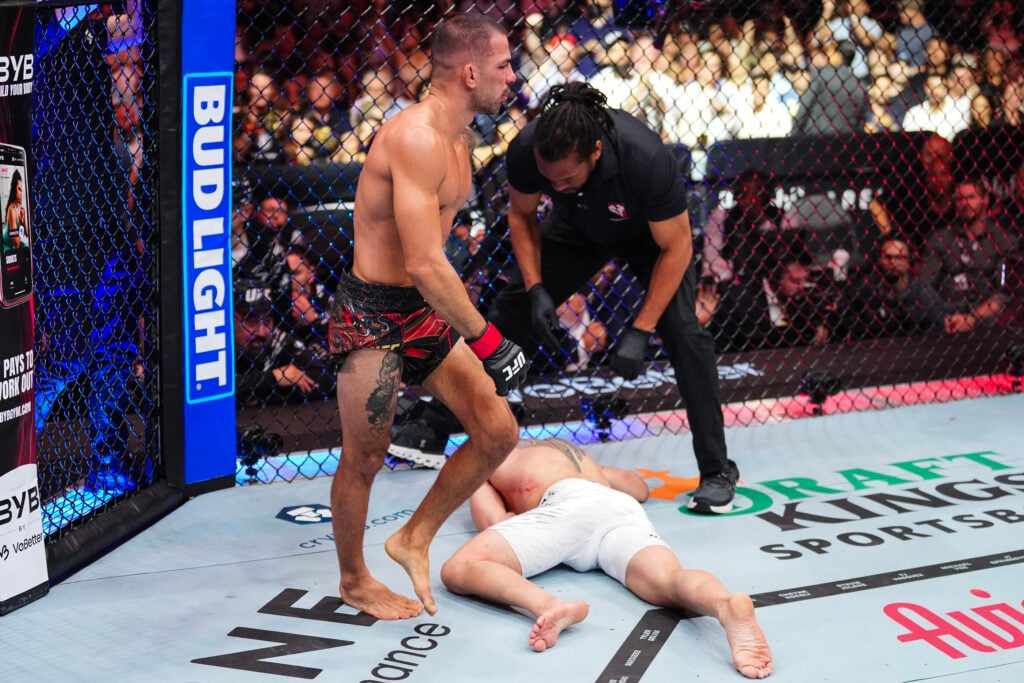 Alexandre Pantoja walking away from Kai Kara-France at UFC 317