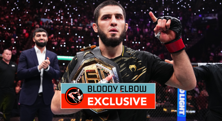 Islam Makhachev holding his UFC title belt after winning at UFC 311. Overlay text reads: BLOODY ELBOW EXCLUSIVE
