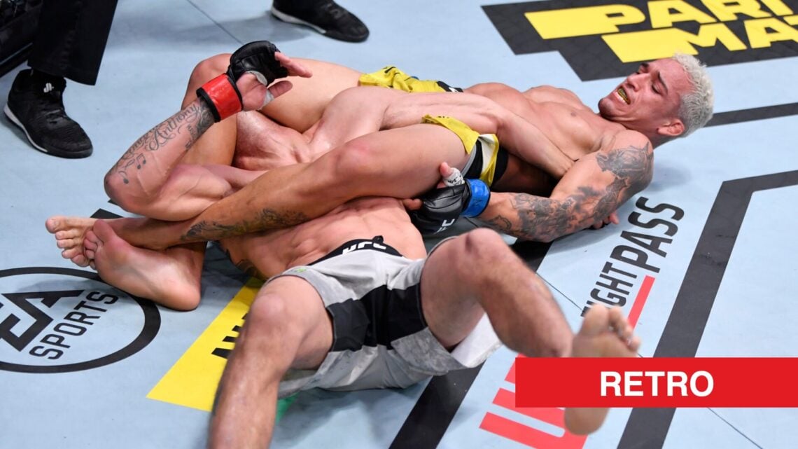 Charles Oliveira rips Tony Ferguson's arm during UFC 256 fight