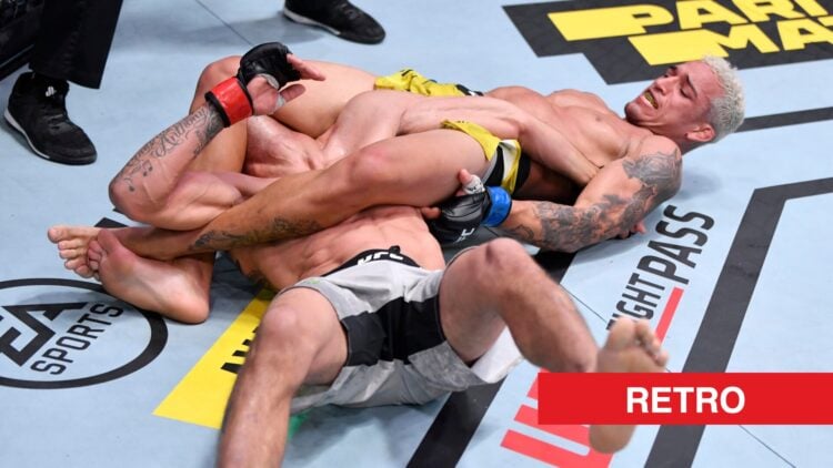 Charles Oliveira rips Tony Ferguson's arm during UFC 256 fight