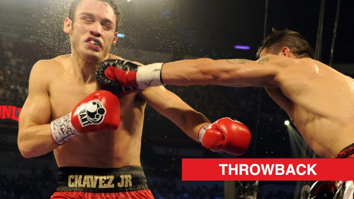 Sergio Martinez punches Julio Cesar Chavez Jr. during their WBC middleweight title fight.