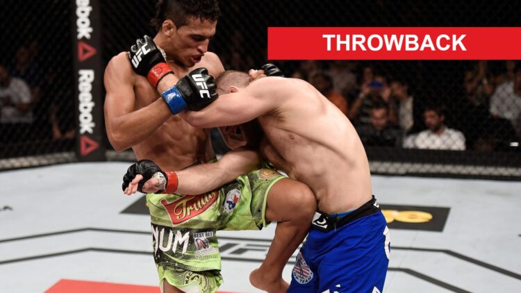 Charles Oliveira lays a knee into Nick Lentz during their UFC rematch