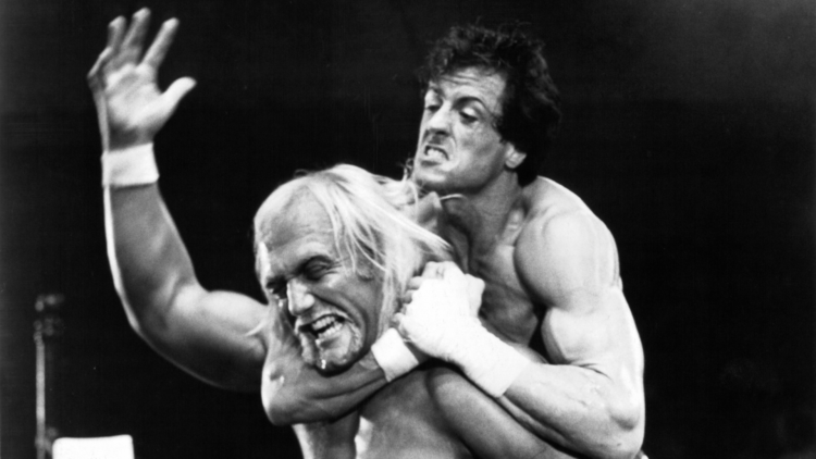 Sylvester Stallone putting Hulk Hogan in a chokehold during filming for Rocky III