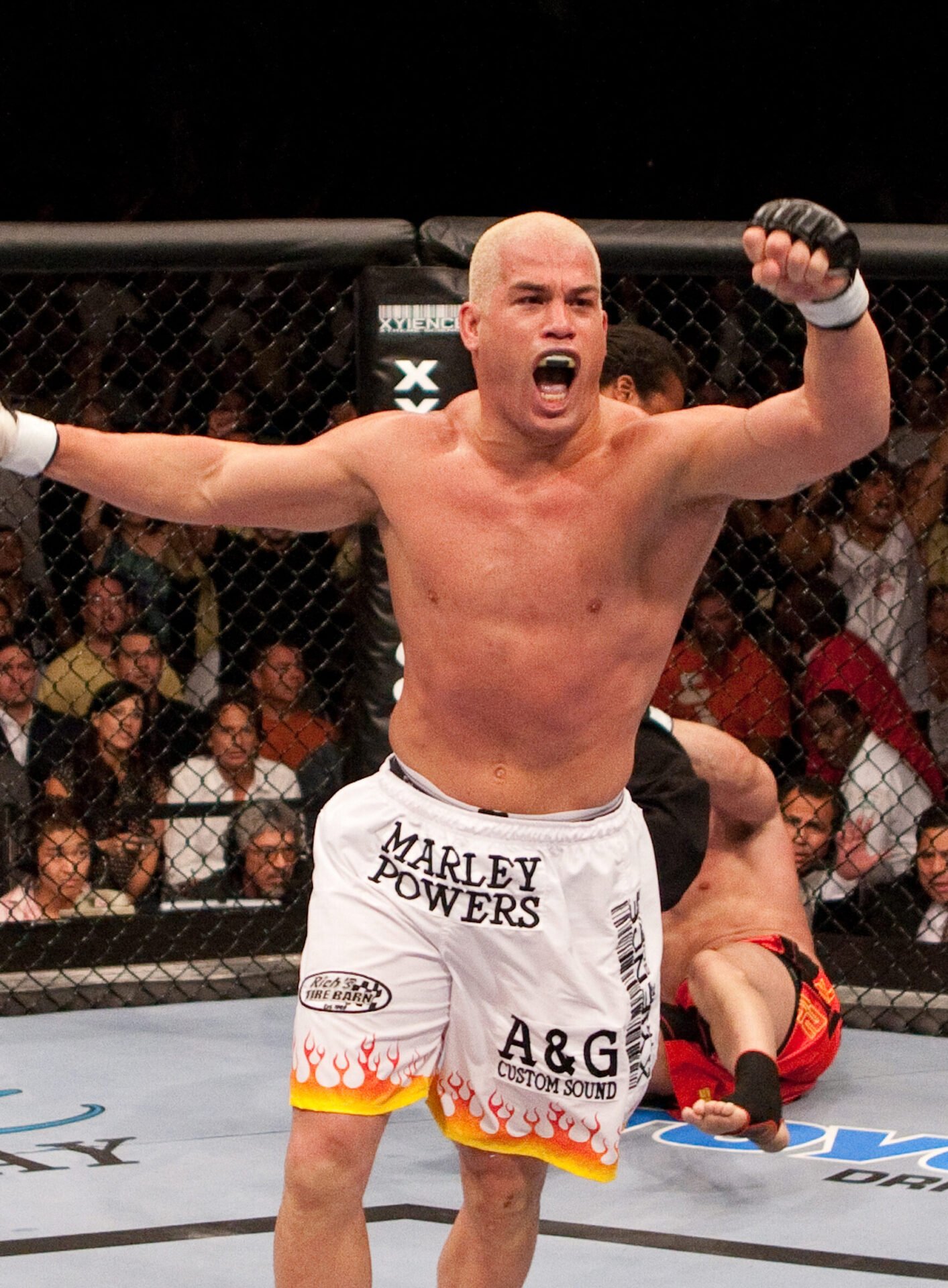 Tito Ortiz celebrates KO win over Ken Shamrock at UFC 61