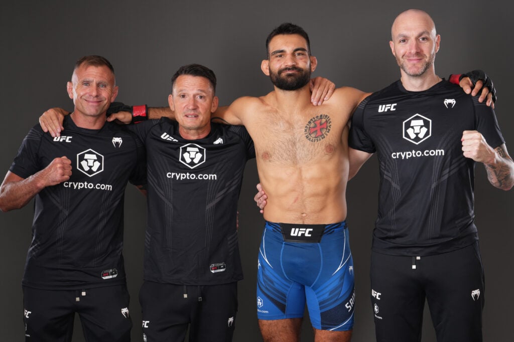 Benoit Saint-Denis poses with his team after beating Gabriel Miranda in their fight at UFC Paris.