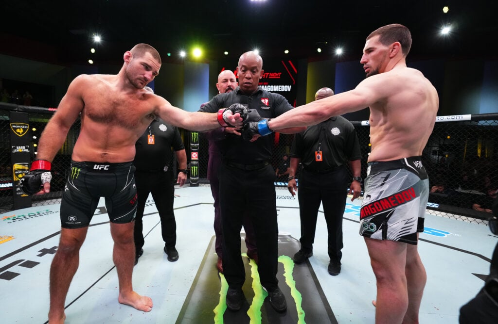 Sean Strickland and Abus Magomedov touch gloves just before their UFC Fight Night bout