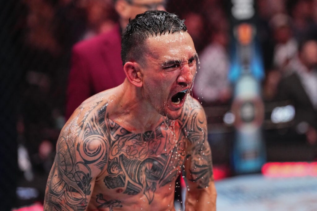 Max Holloway screams in the Octagon at UFC 300