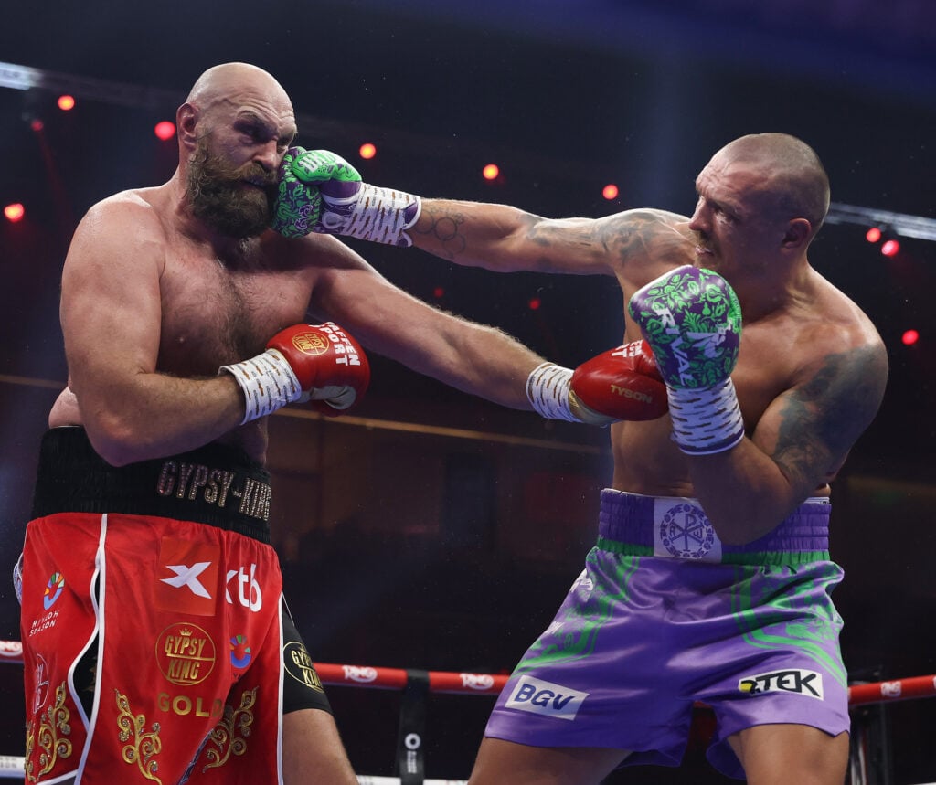 Tyson Fury and Oleksandr Usyk punch each other in their second fight