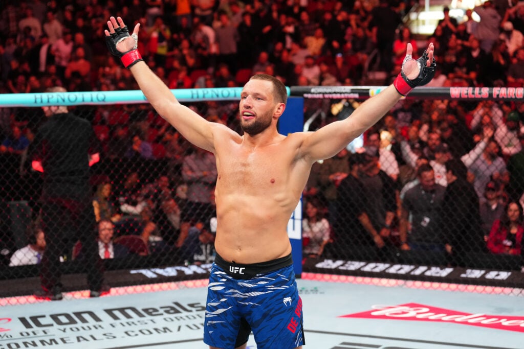 Reinier de Ridder celebrates after beating Bo Nickal by TKO