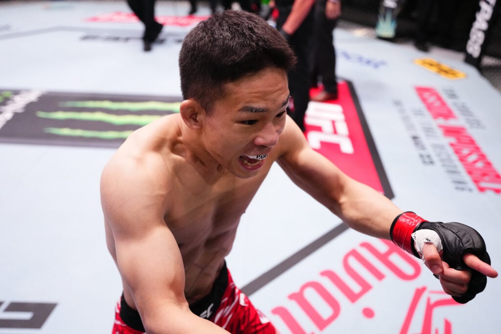 Hyun Sung Park celebrates after beating Carlos Hernandez