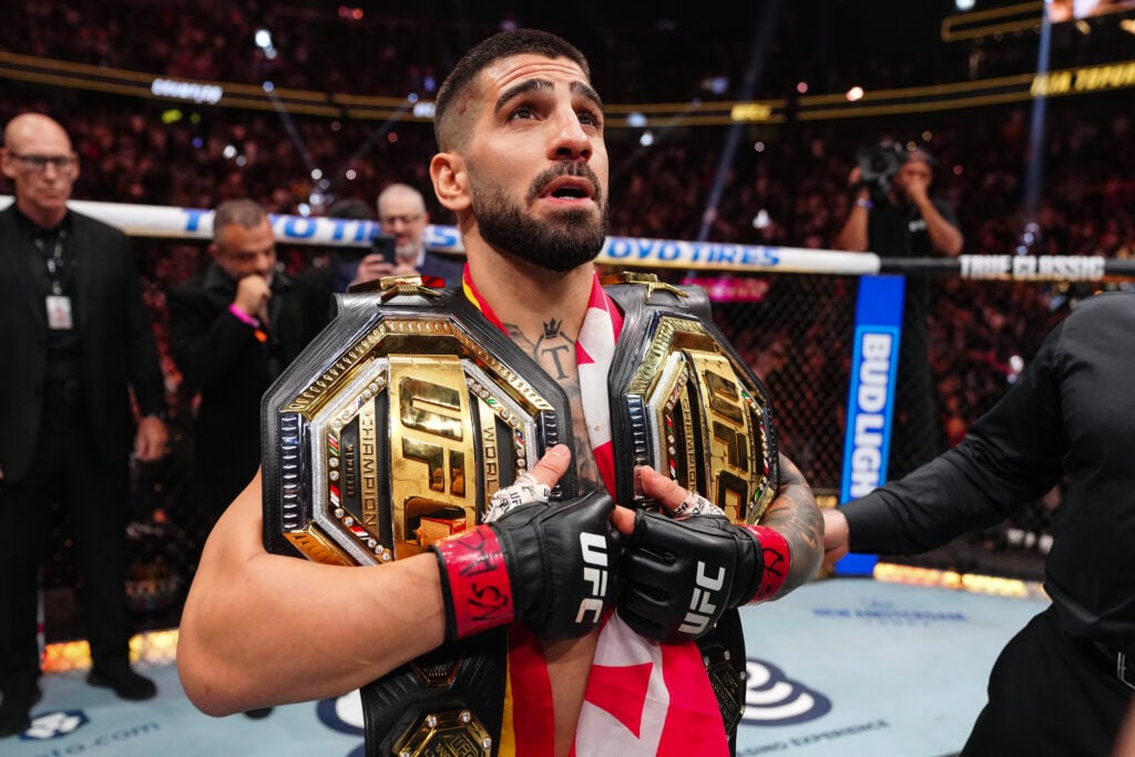 Ilia Topuria holds two UFC belts after knocking out Charles Oliveira at UFC 317