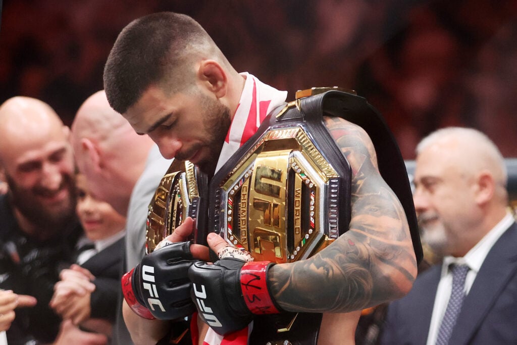 Ilia Topuria holds two UFC titles after knocking out Charles Oliveira in their fight at UFC 317