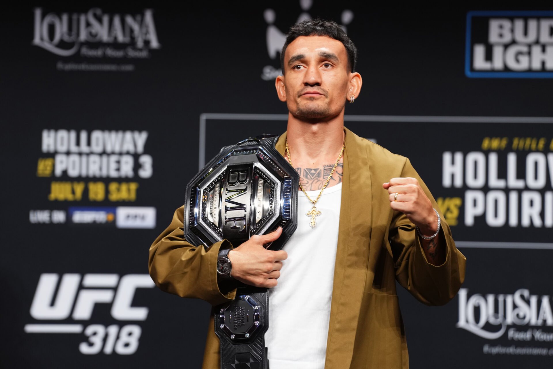 Max Holloway with BMF belt at UFC 318 press conference