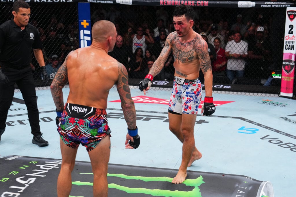 Max Holloway points to the center in his fight with Dustin Poirier at UFC 318