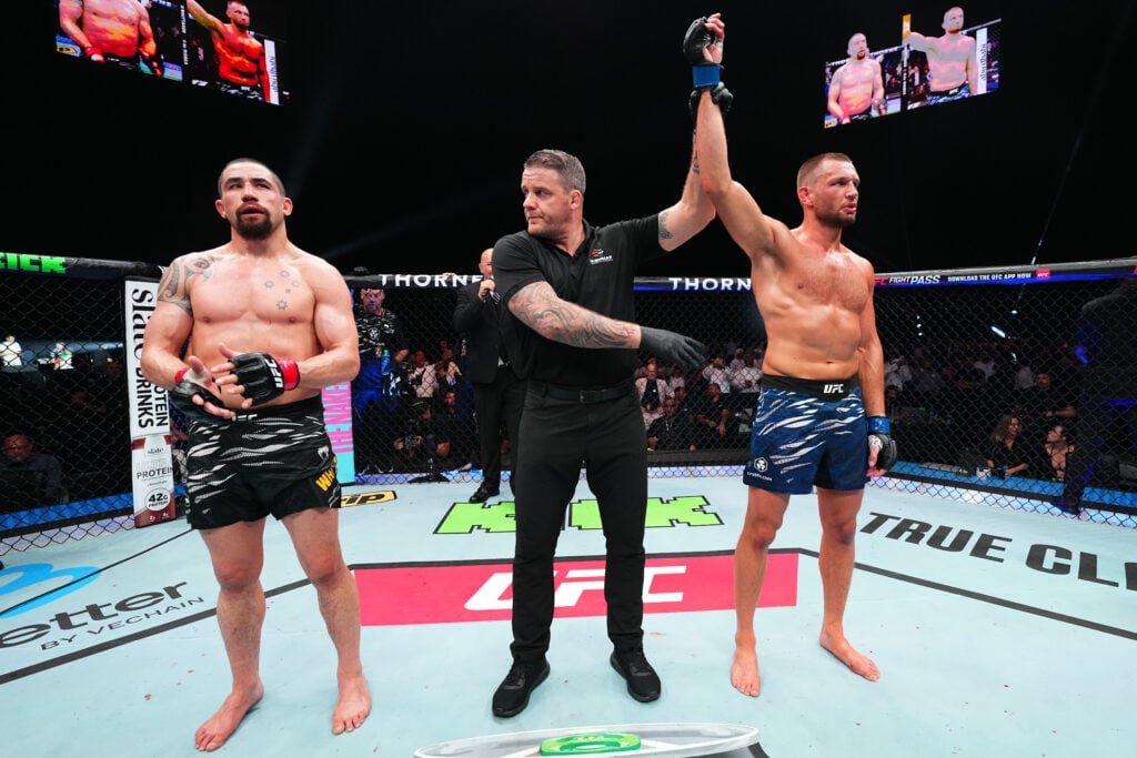 Robert Whittaker and Reinier De Ridder react to decision at UFC Abu Dhabi