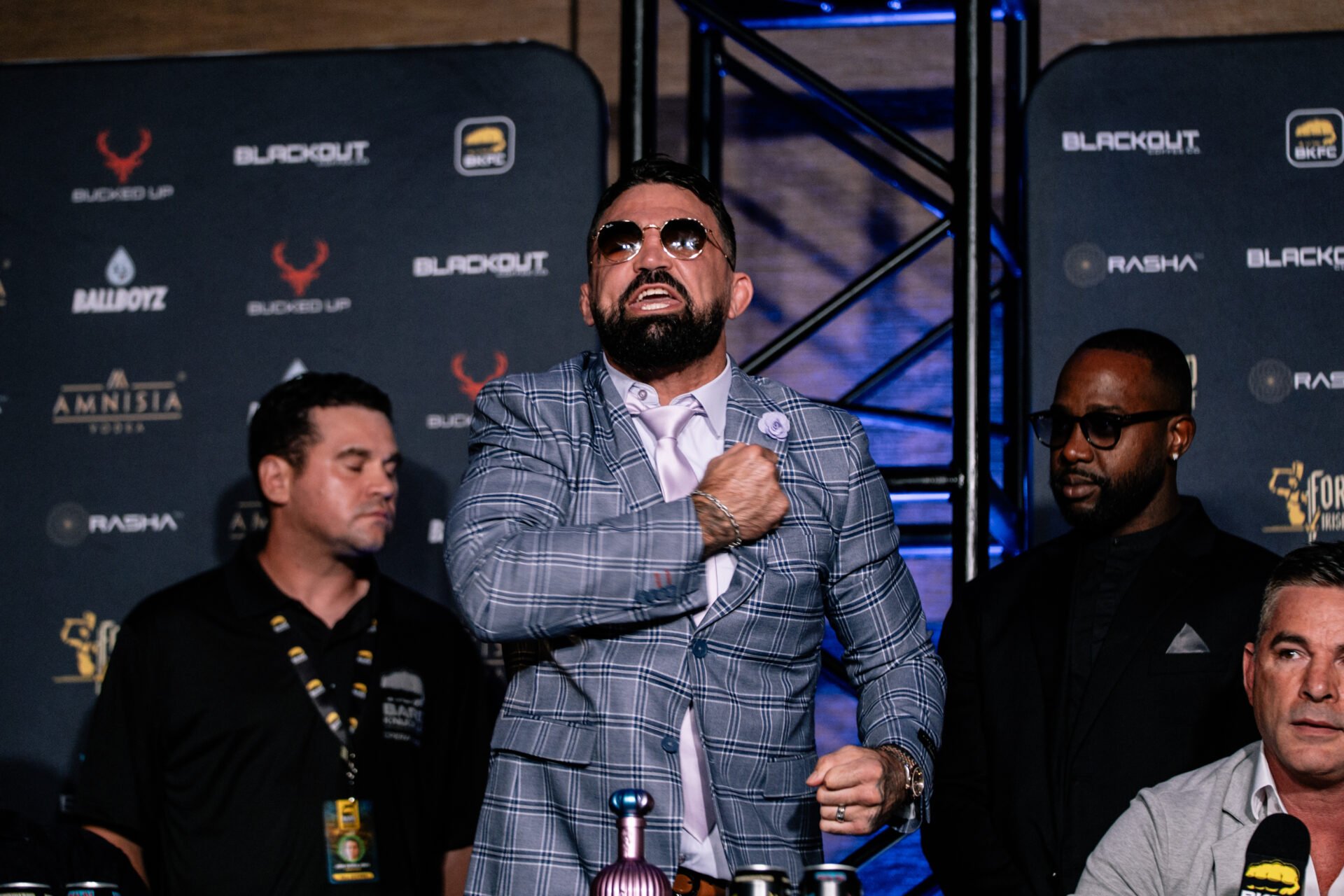 Mike Perry yells at the crowd during a BKFC Champions Summit press conference