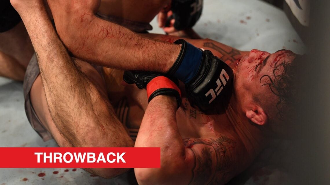 Jake Matthews lands a ground strike on Diego Sanchez during their fight at UFC 253.