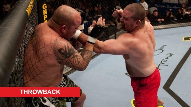Tank Abbott punches his opponent during a heavyweight fight at UFC 45