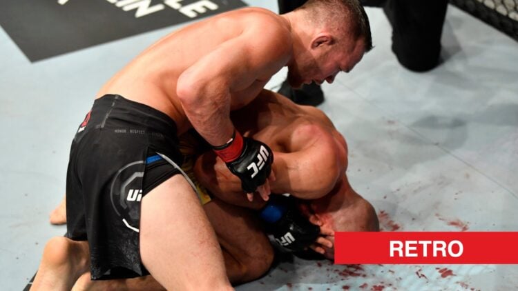 Petr Yan lands ground-and-pound on Jose Aldo during UFC 251 title fight