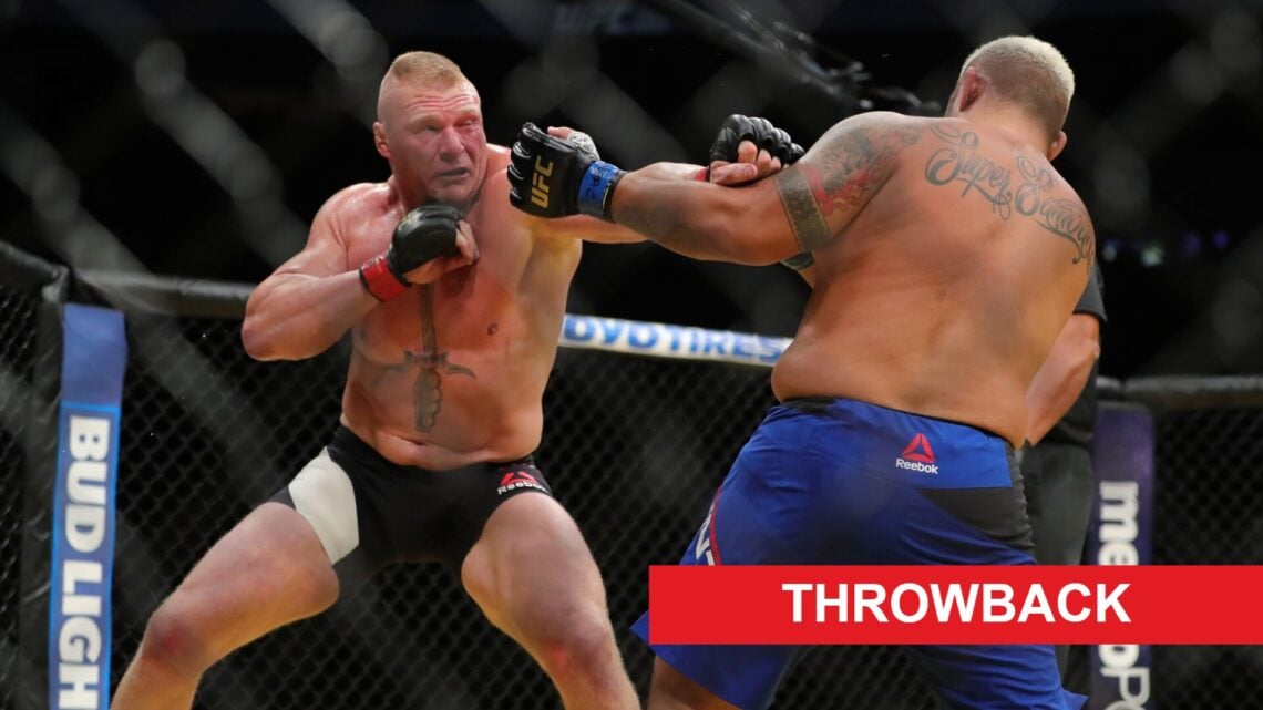 Brock Lesnar punches Mark Hunt during their fight at UFC 200