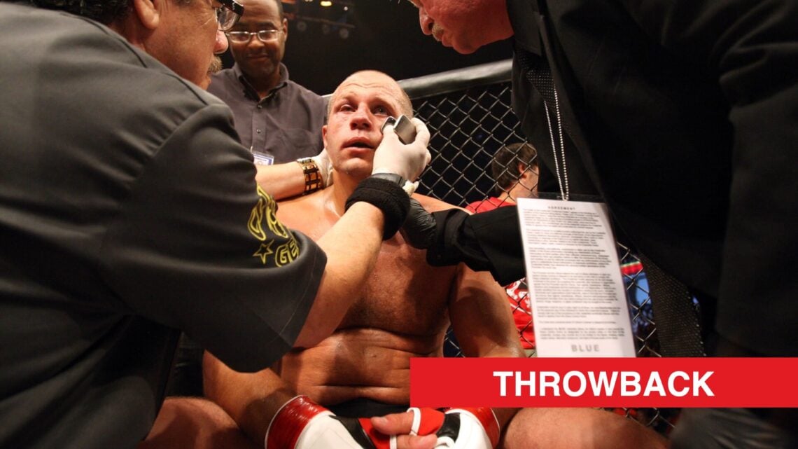 Fedor Emelianenko receives attention from his cut man following TKO loss to Dan Henderson