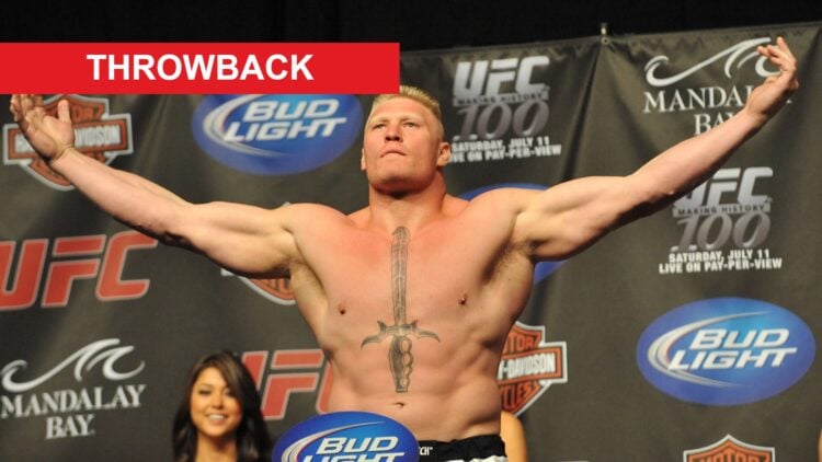 Brock Lesnar poses with his arms out at the UFC 100 press conference