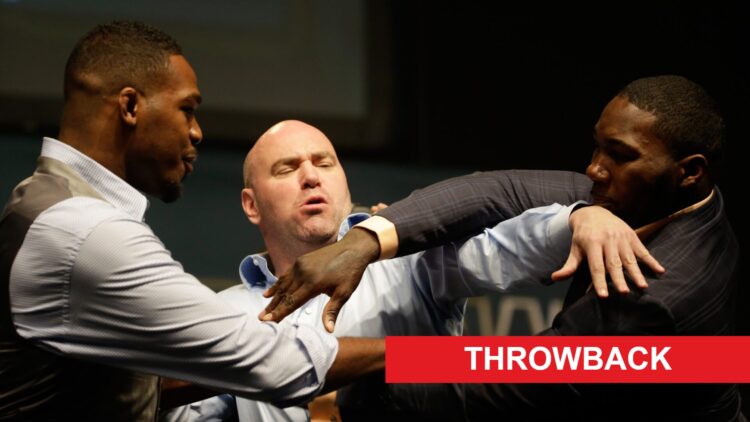 Dana White attempts to separate Jon Jones and Anthony Johnson during a faceoff