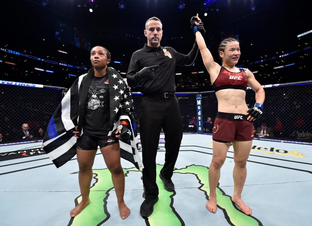 Zhang Weili has her hand raised after beating Danielle Taylor in their fight at UFC 227