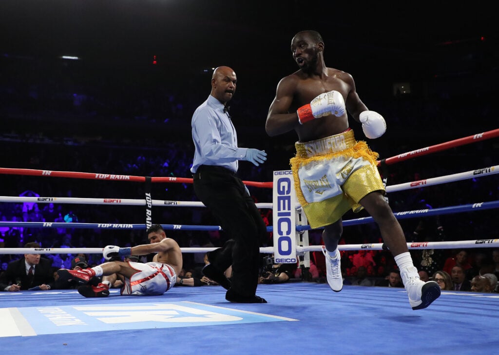 Terence Crawford scores knockdown against Amir Khan during title fight