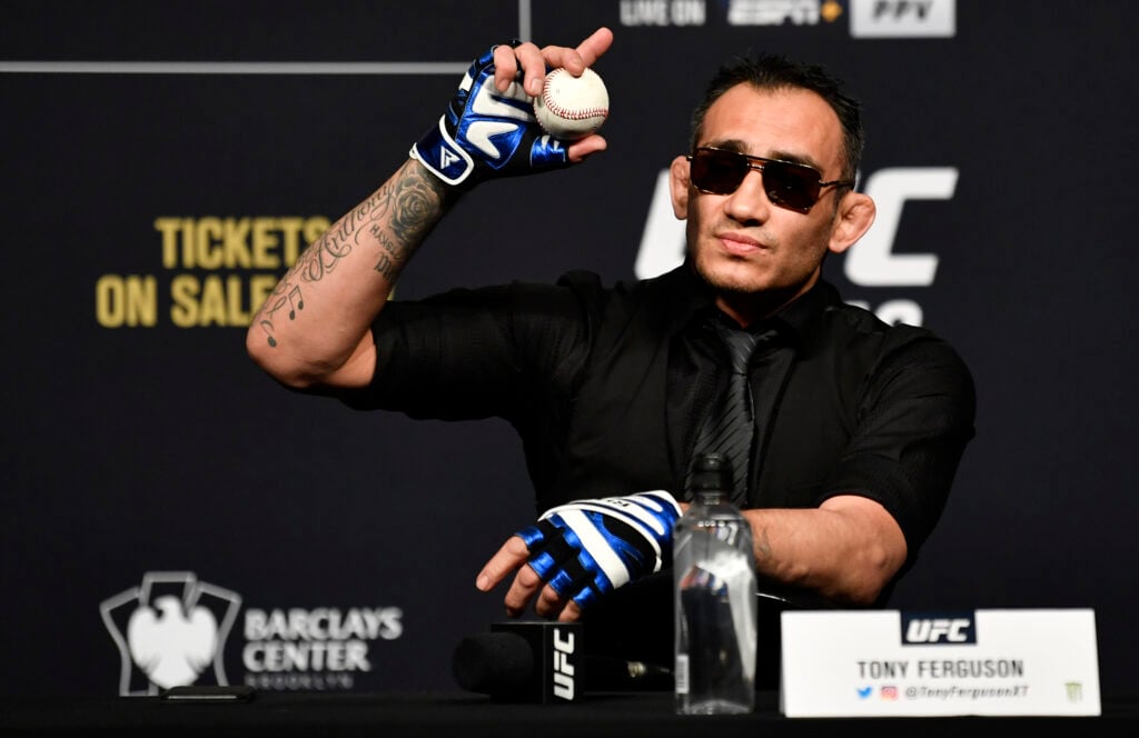 Tony Ferguson holds a baseball at the UFC 249 press conference