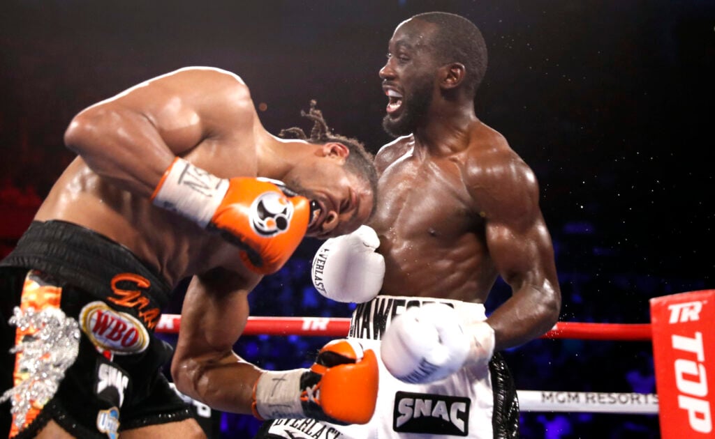 Terence Crawford lands big punches on Shawn Porter during title fight