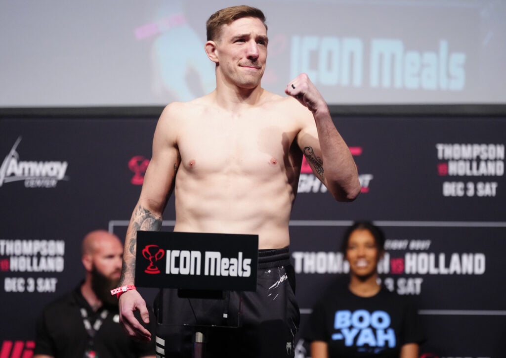 Kyle Daukaus on stage at the UFC Orlando ceremonial weigh-ins