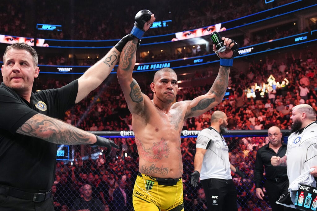 Alex Pereira celebrates after defeating Jan Blachowicz in their fight at UFC 291