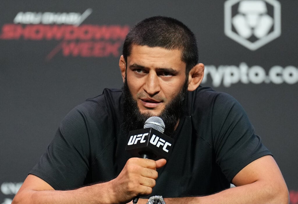 Khamzat Chimaev answers a question during the UFC 294 pre-fight press conference