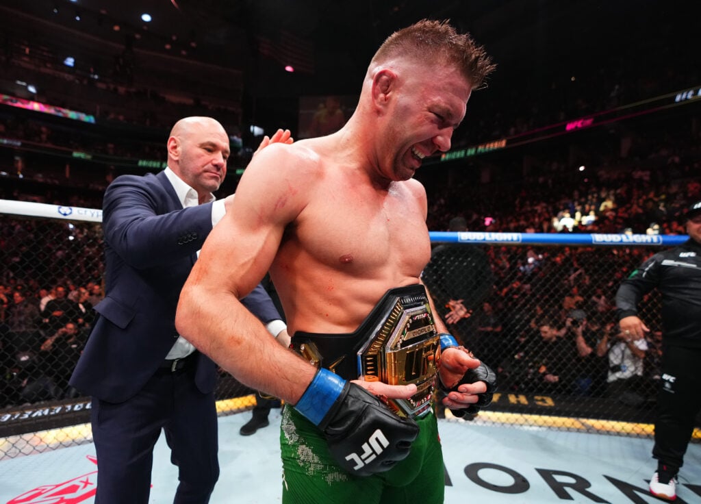 Dana White wraps the UFC middleweight title around Dricus du Plessis after his win over Sean Strickland at UFC 297