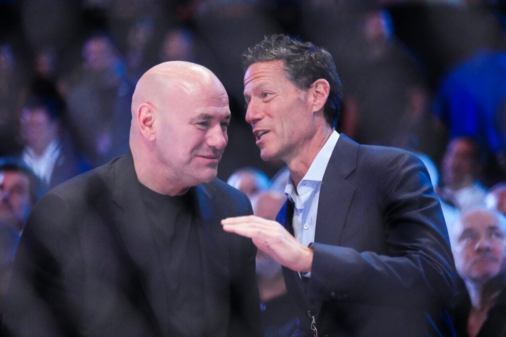 Dana White and Mark Shapiro cageside at a UFC event