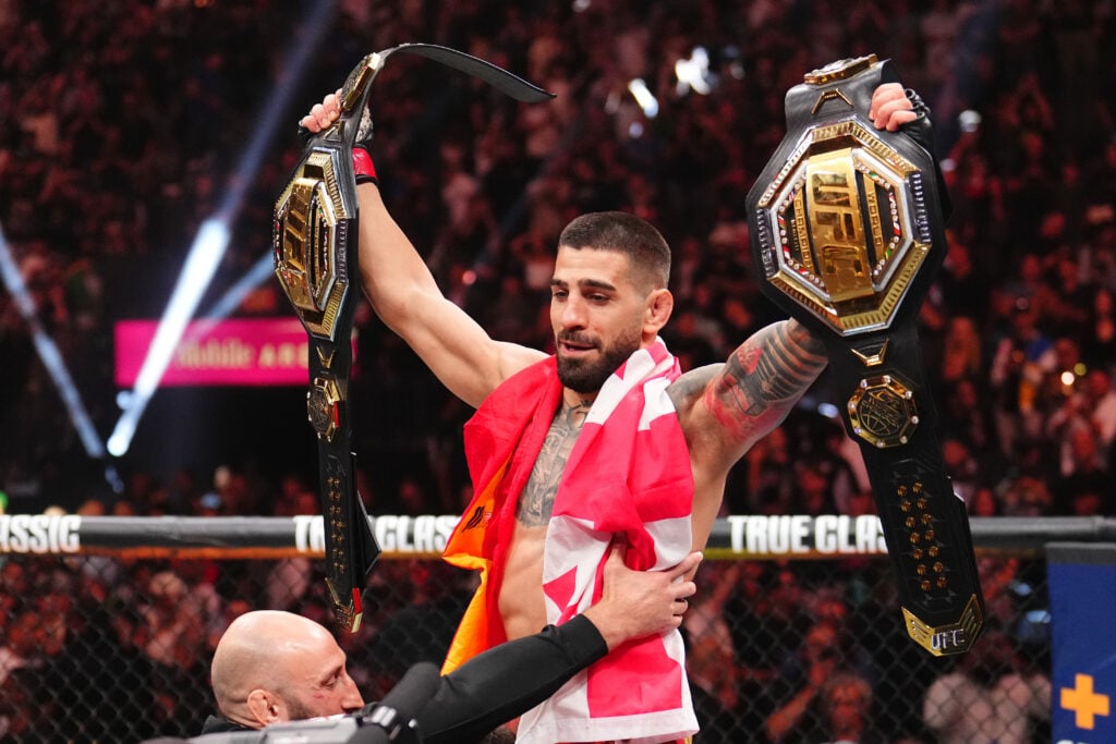Ilia Topuria celebrates defeating Charles Oliveira