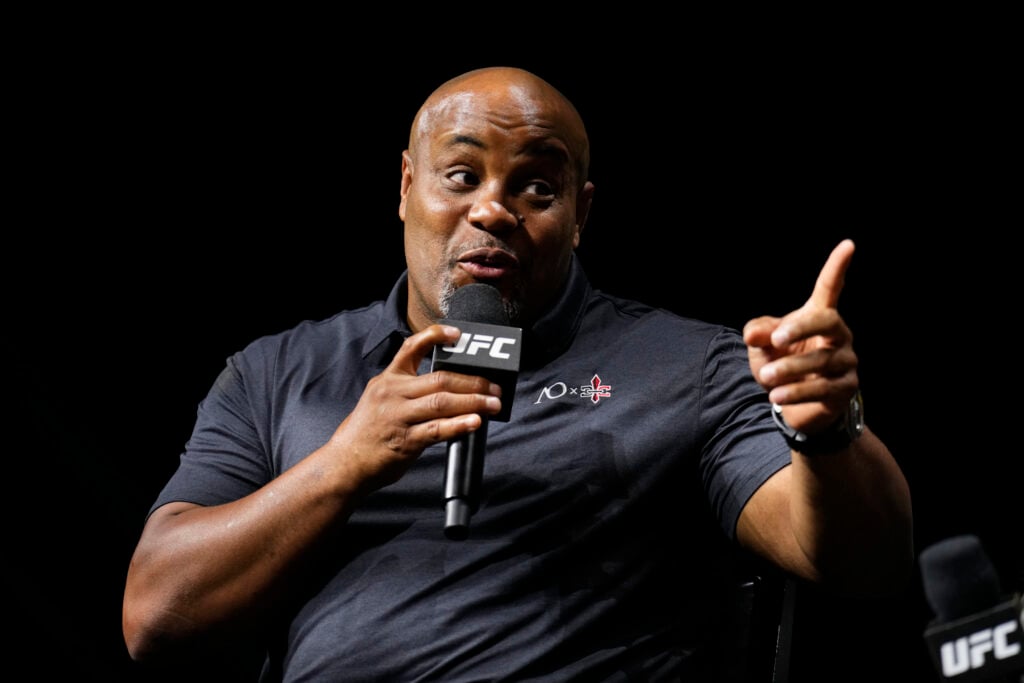 Daniel Cormier on stage during a Q&A session before the UFC 318 pay-per-view event
