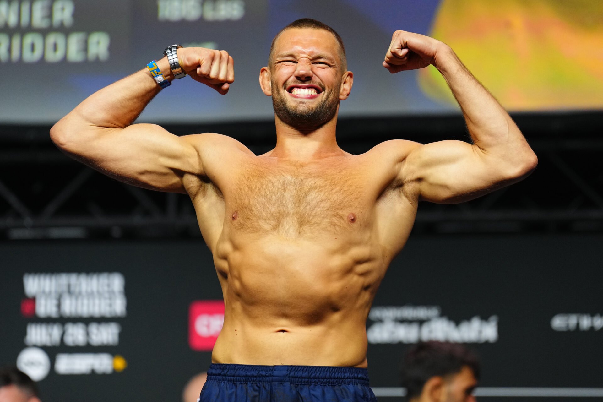 Reinier de Ridder poses on the scale during the UFC Abu Dhabi ceremonial weigh-in