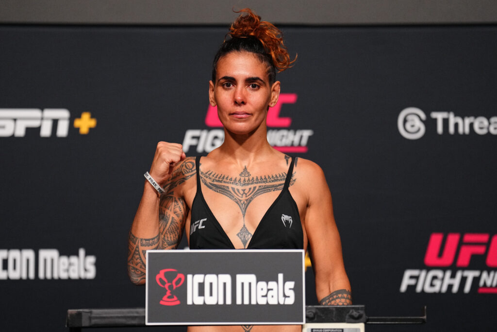 Nora Cornolle poses on the scale during the UFC Vegas 108 weigh-in