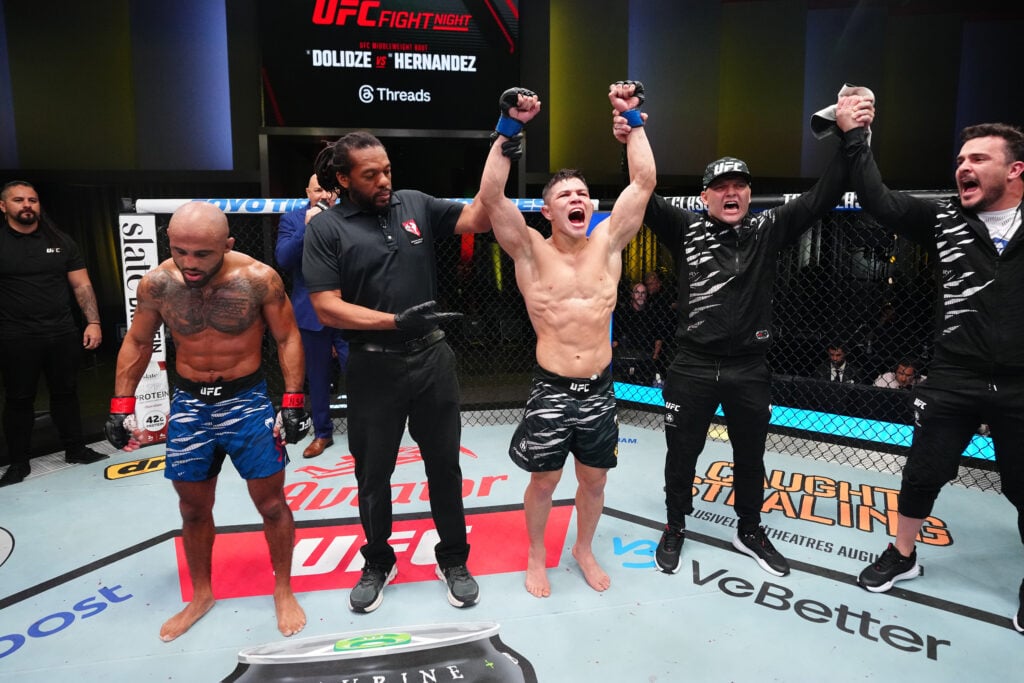 Image of Miles Johns and Jean Matsumoto reacting after split decision result at UFC Vegas 109.