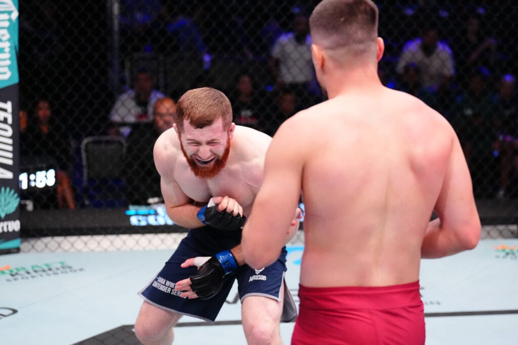 Murtaza Talha reacts after a kick to the body from Baysangur Susurkaev during their fight on Dana White's Contender Series