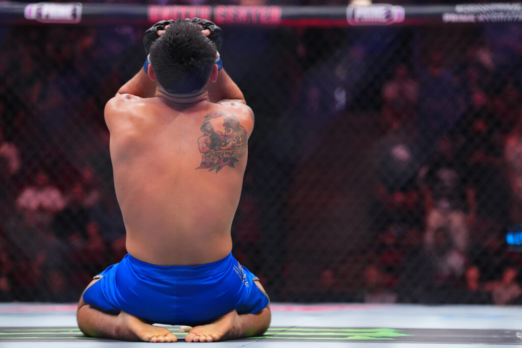 Joseph Morales reacts after submitting Alibi Idiris to win The Ultimate Fighter 33 flyweight tournament at UFC 319