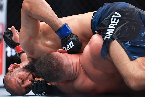 Khamzat Chimaev controls Du Plessis during UFC 319 fight