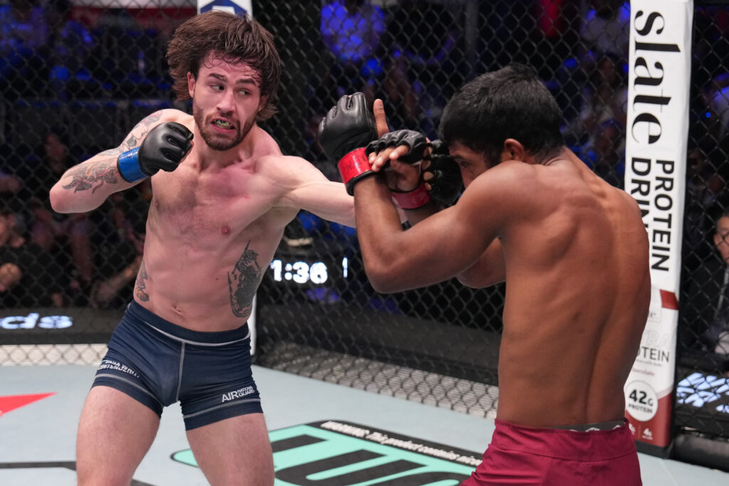 Louis Lee Scott punches Kaushik Saikumar during their DWCS fight