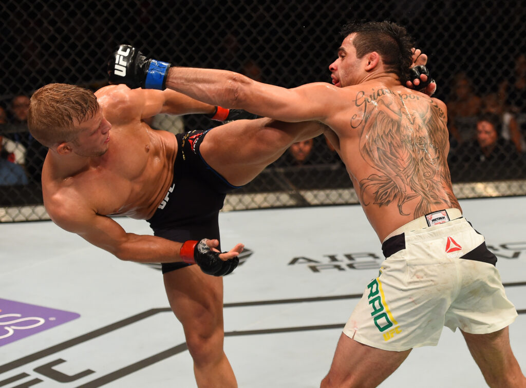 TJ Dillashaw catches Renan Barao with a headkick at UFC Fight Night