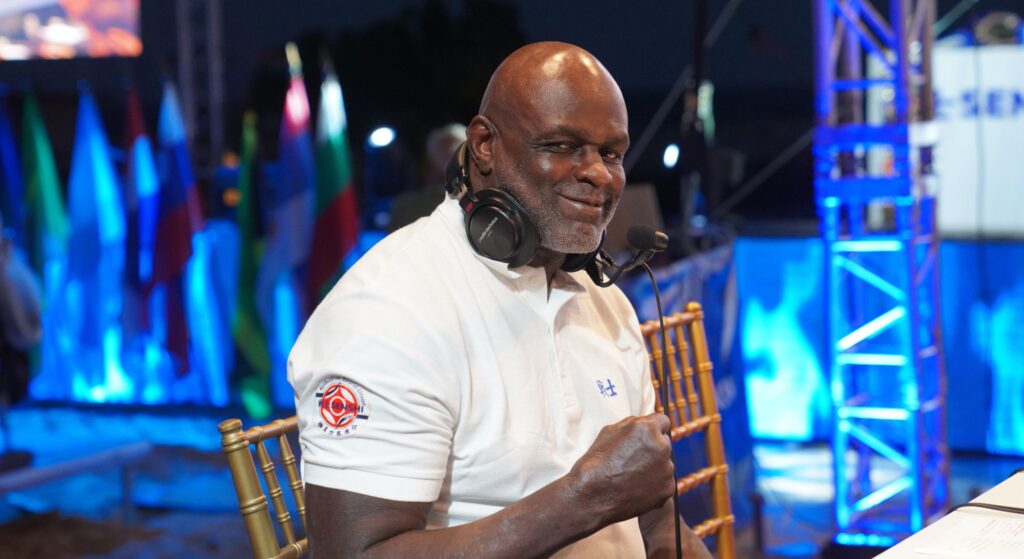 Ernesto Hoost poses while sitting at the desk for SENSHI